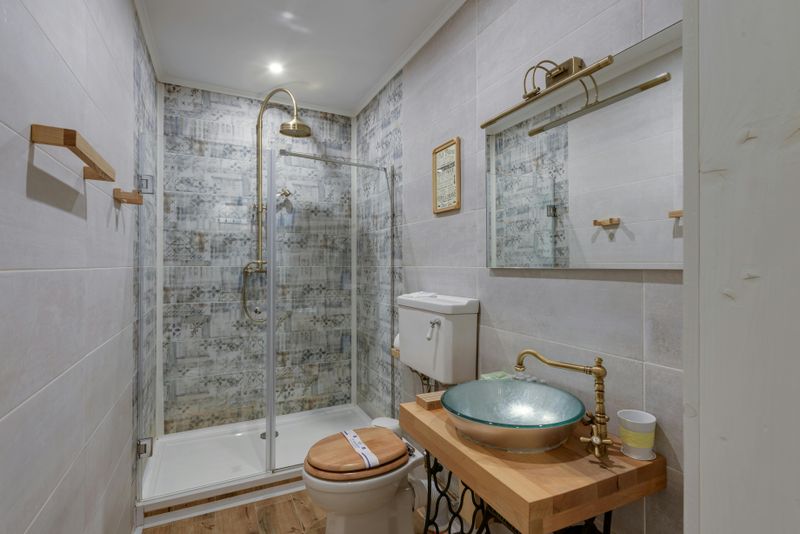 Install a Spa-Like Showerhead or Upgrade Bathroom Hardware