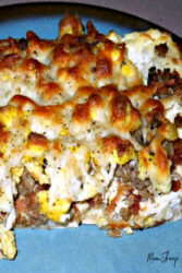 Pizza crust topped with ricotta, breakfast meat, egg, and cheese.
