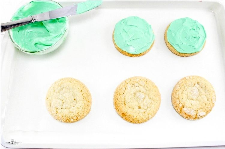 Frosting the cookies