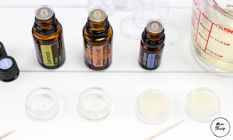 adding essential oils in the containers.