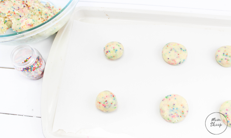 Whoopie pie cookie dough pressed on a baking sheet