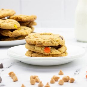 Cookies with reeses peanut butter cups, chocolate chips, butterscotch chips, and peanut butter