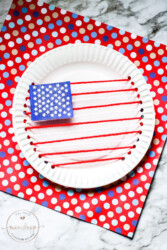 American Flag made out of paper plate and yarn