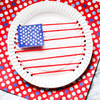 American Flag made out of paper plate and yarn