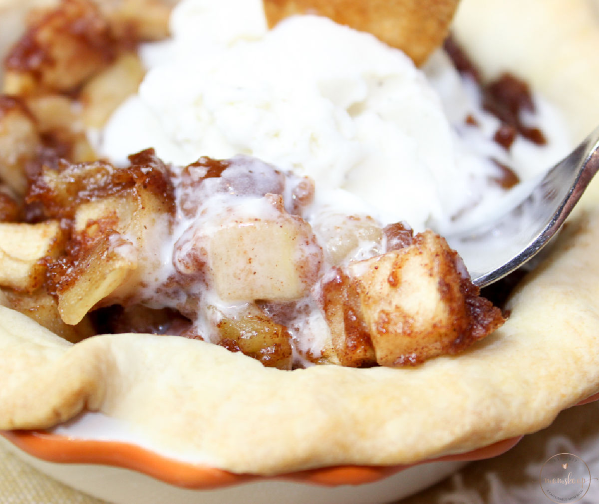 A fork full of baked apples