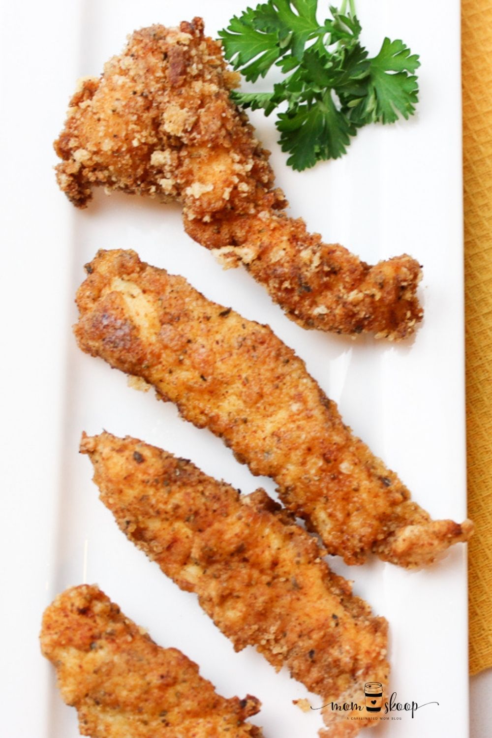 Homemade Chicken Tenders on a white tray