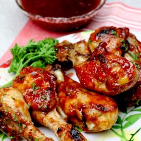 Chicken drumsticks covered in BBQ sauce