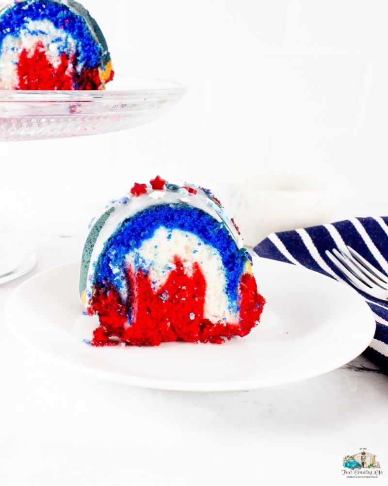 Slice of patriotic cake on a white plate
