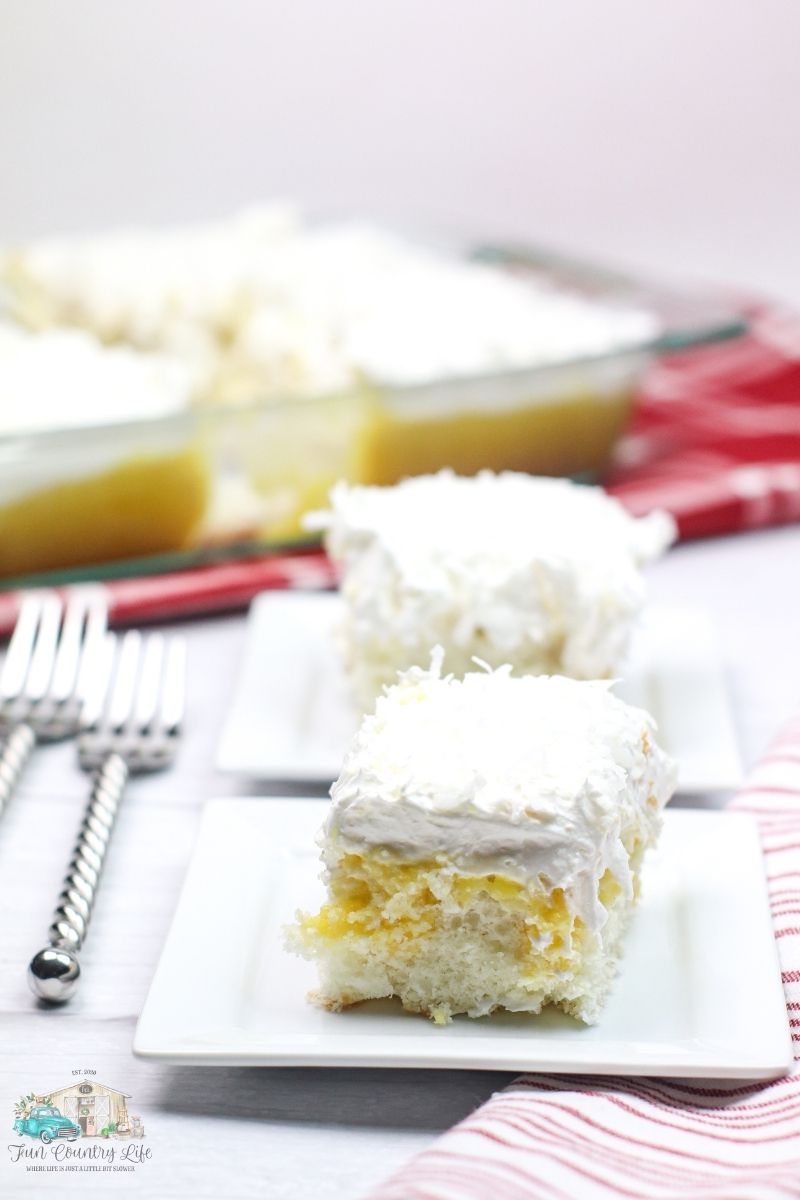 Slice of Coconut Poke Cake on a plate