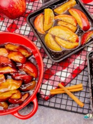 Baked Apples in a red bowl and a cast iron skillet