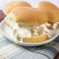 Chicken Sliders topped with Alabama White Sauce