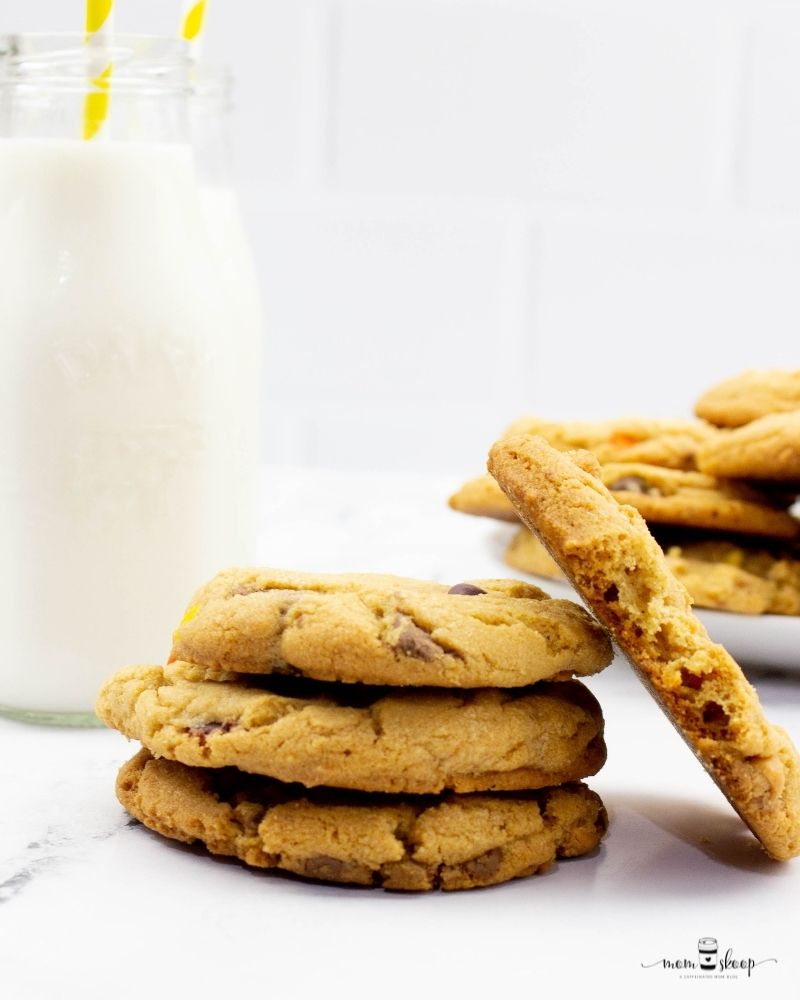 Cookies with a glass of milk with a straw