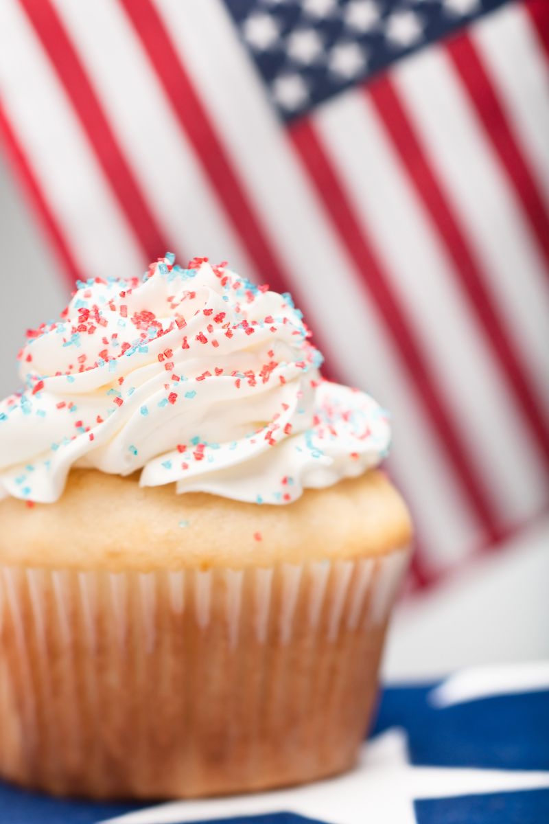 Vanilla cupcake with red and blue sprinkles