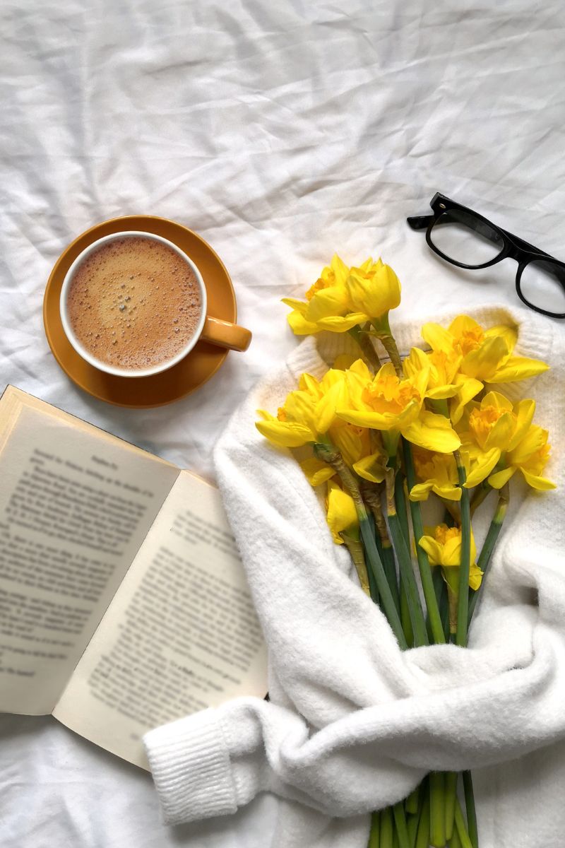 Flowers, book, coffee, and relaxing.