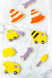 Sugar cookies cut out in the shape of construction equipment