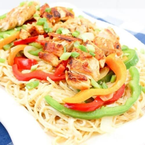 Chicken, peppers, and pasta on a plate