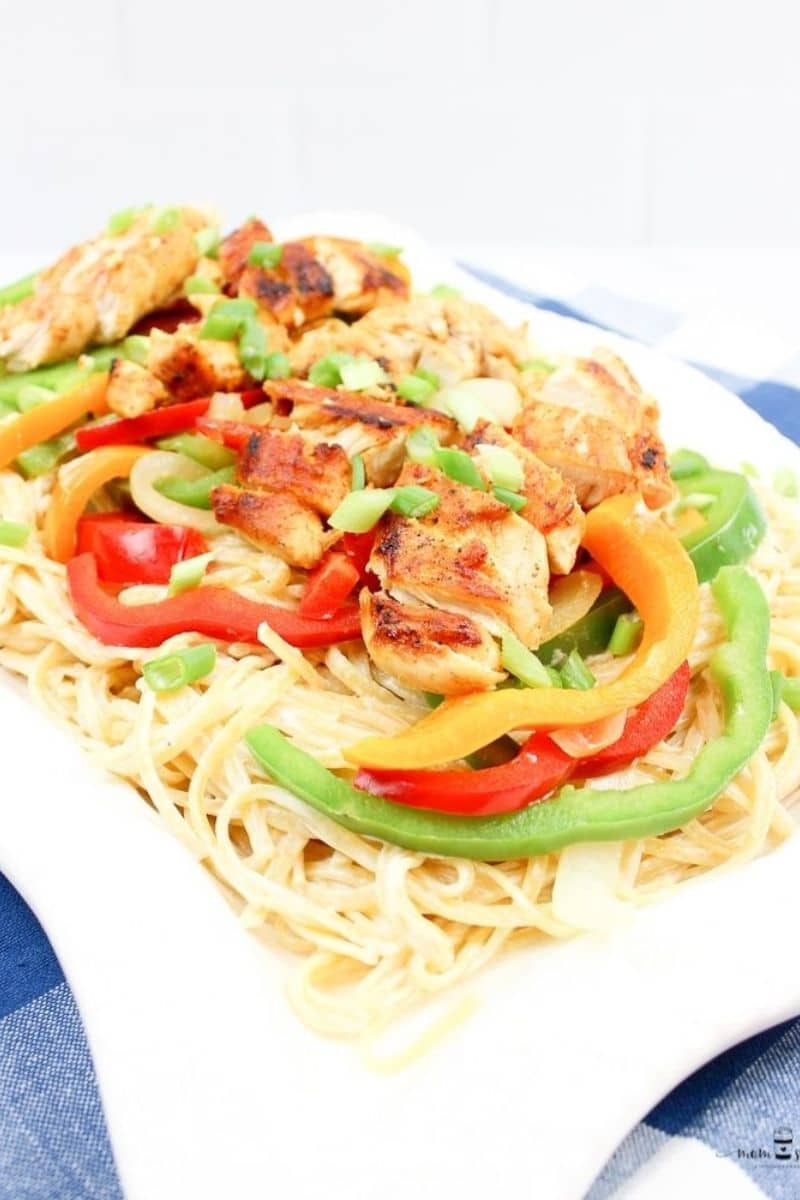 Chicken, peppers, and pasta on a plate