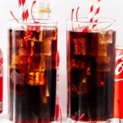 two glasses of cola and grenadine.