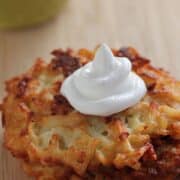 Hashbrown Latkes and Applesauce on a wooden board
