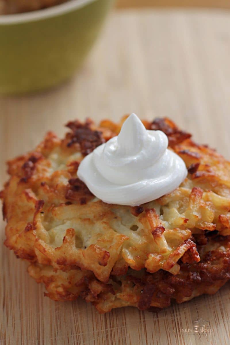 Hashbrown Latkes and Applesauce on a wooden board