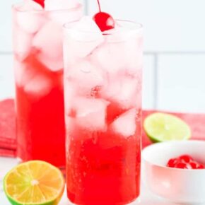 Shirley Temple mocktail with grenadine, sprite, lime, and cherries