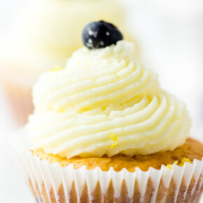 Lemon Blueberry Bisquick Cupcakes topped with frosting and blueberries