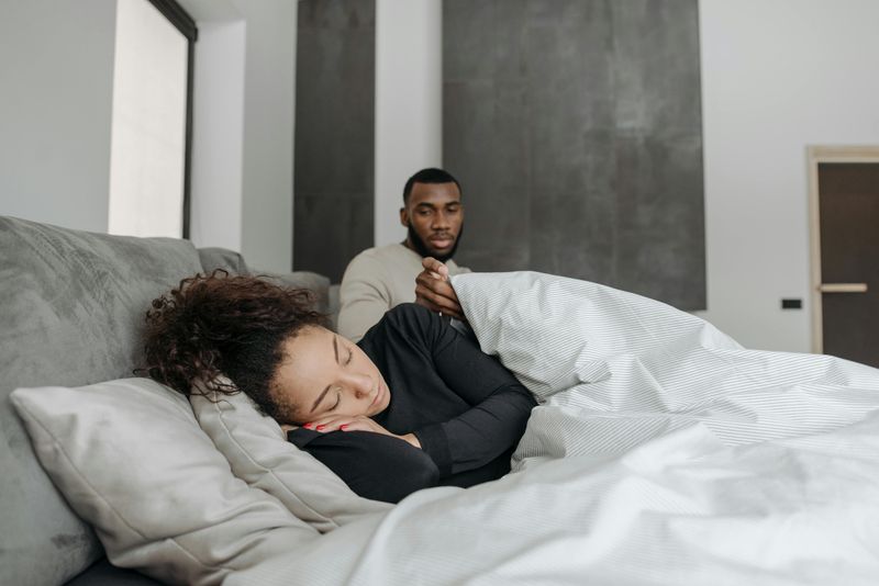 Covering them with a blanket when they fall asleep