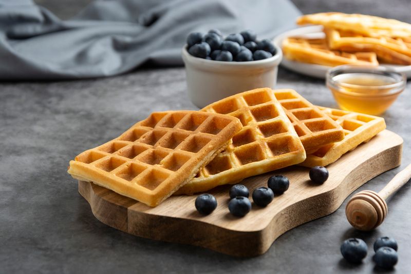 Light and Fluffy Vegan Waffles with Blueberry Sauce