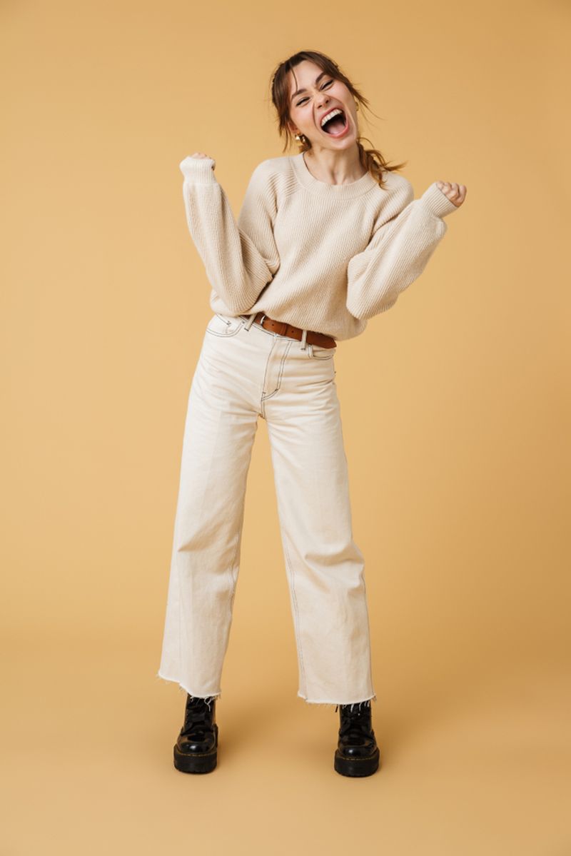 Pair White Jeans with Cozy Knit Sweaters
