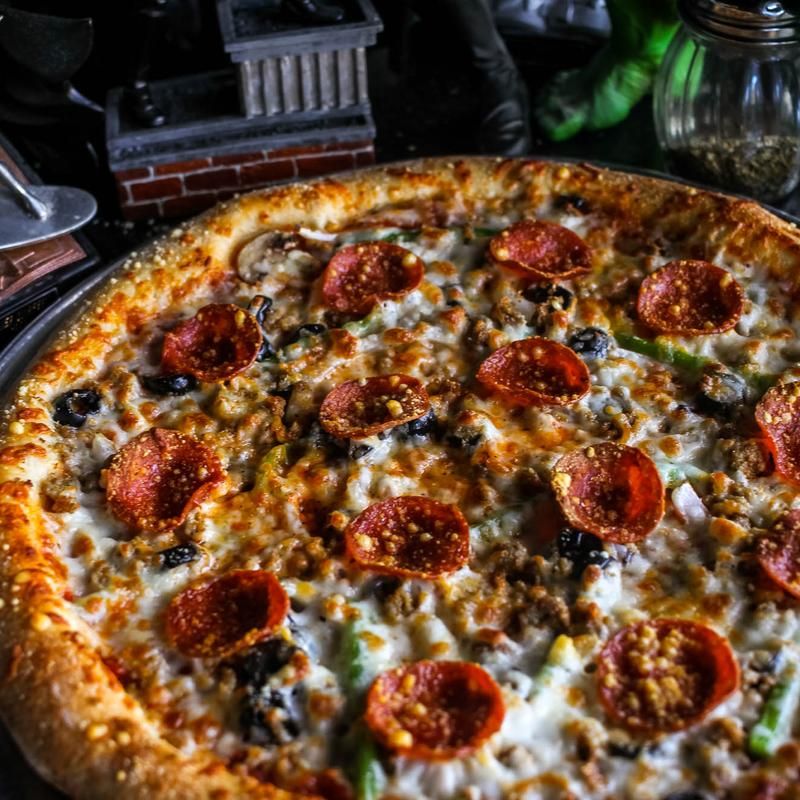 Savage Pizza: Superhero Flavor in Little Five Points