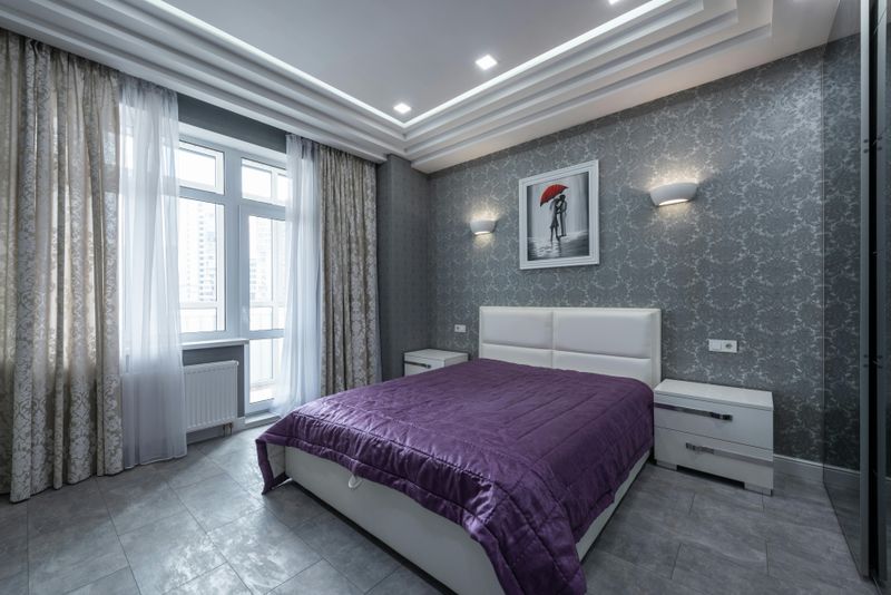 Floor-to-Ceiling Drapes to Make the Room Look Taller