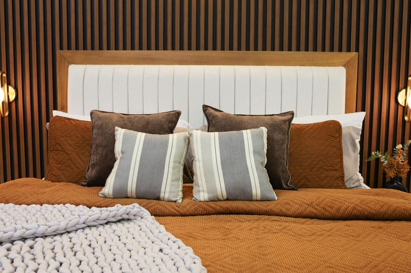 Layer Textures with Throw Pillows and Blankets