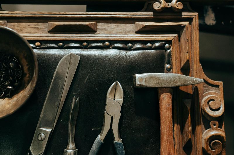 A Basic Tool Kit (Hammer, Screwdrivers, Measuring Tape) That's All Metal and Still True