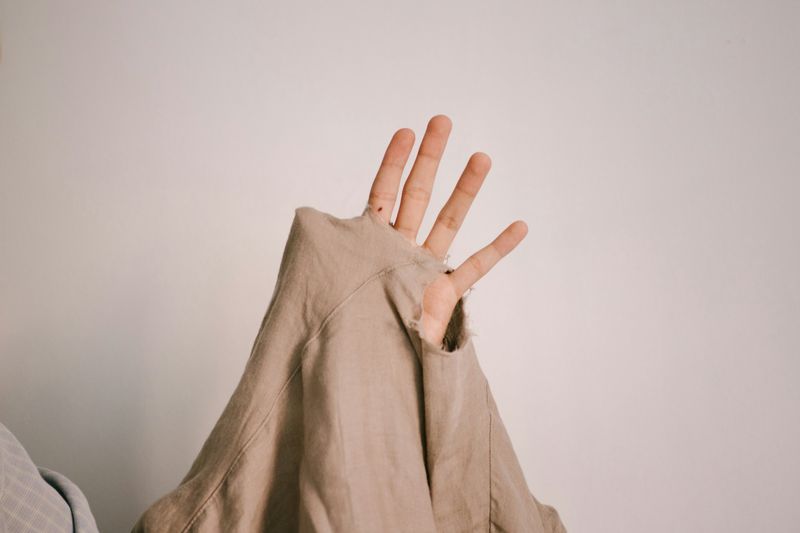 Clothes with Holes or Fraying That Aren't Intentionally Distressed