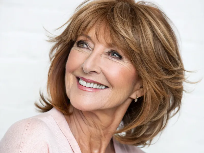 Feathered Layers with Side-Swept Bangs