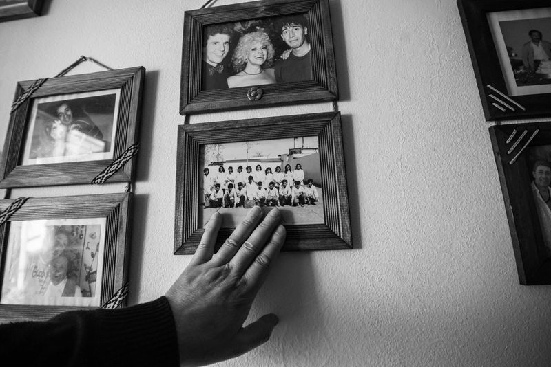 Framed Black-and-White Family Photos with Names Written on the Back