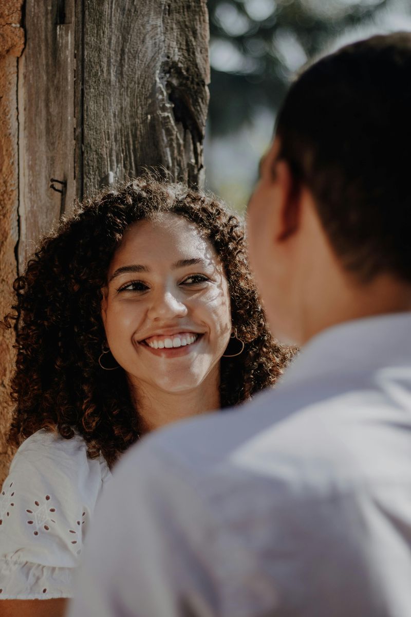 Prolonged Eye Contact Paired with a Soft Smile