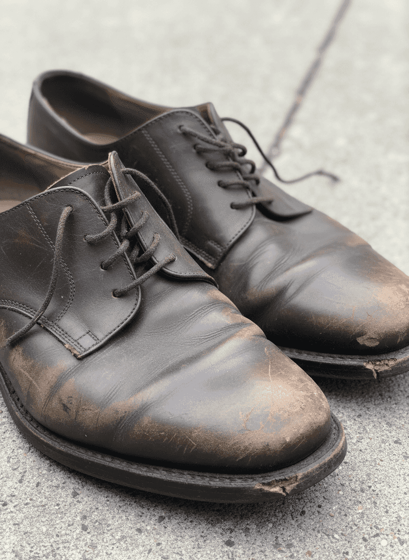 Visibly Worn-Out Shoes
