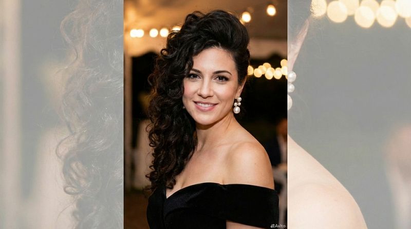 Voluminous Curls Pinned to One Side