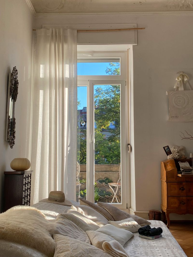 Hang Curtains High and Wide