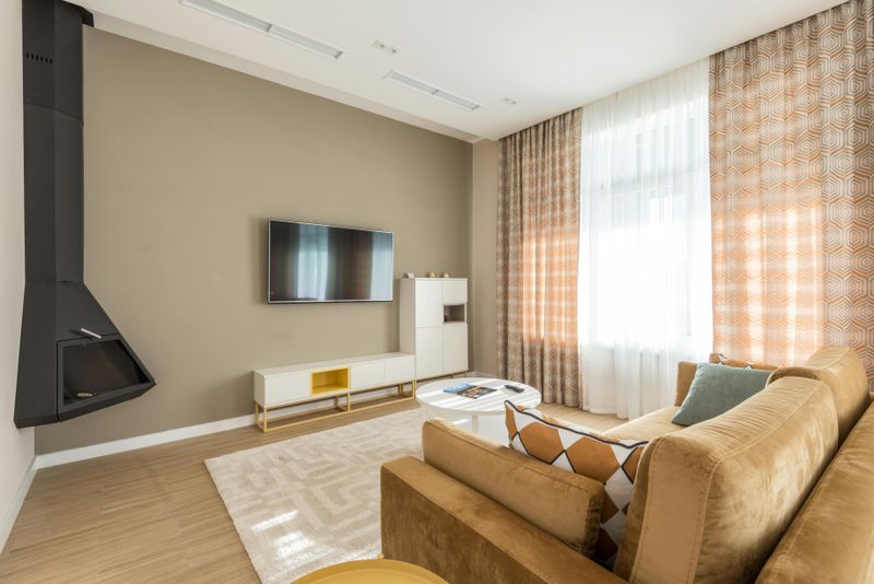 Hang Curtains High and Wide