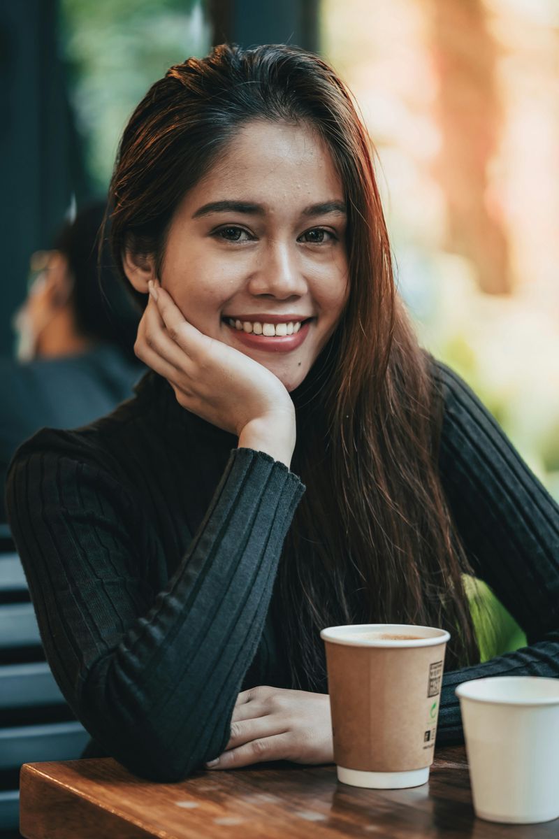 Offering a subtle, genuine smile