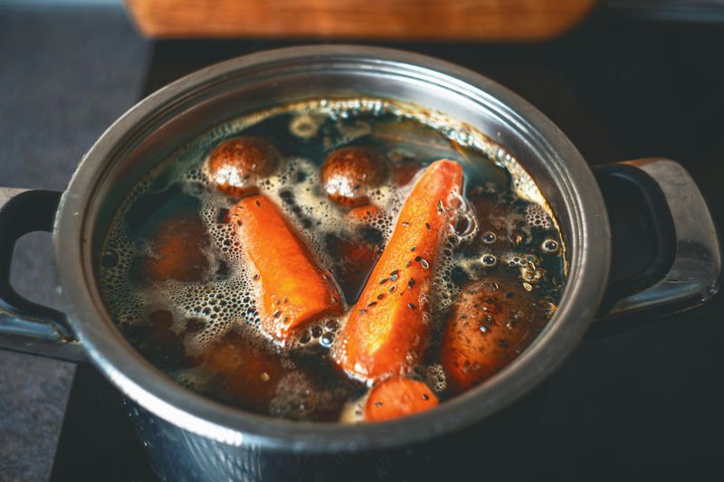 Boiling vegetables until they turn mushy