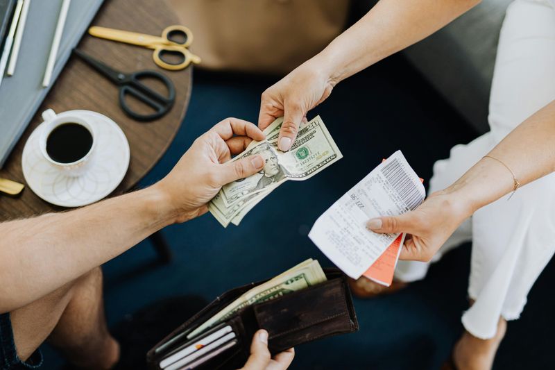 Cash Neatly Organized by Denomination