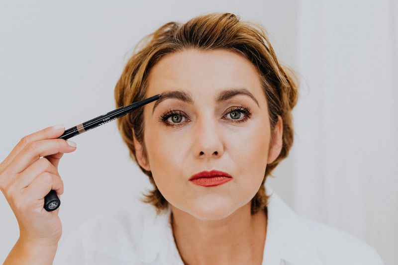Overplucking or Overdrawing Eyebrows