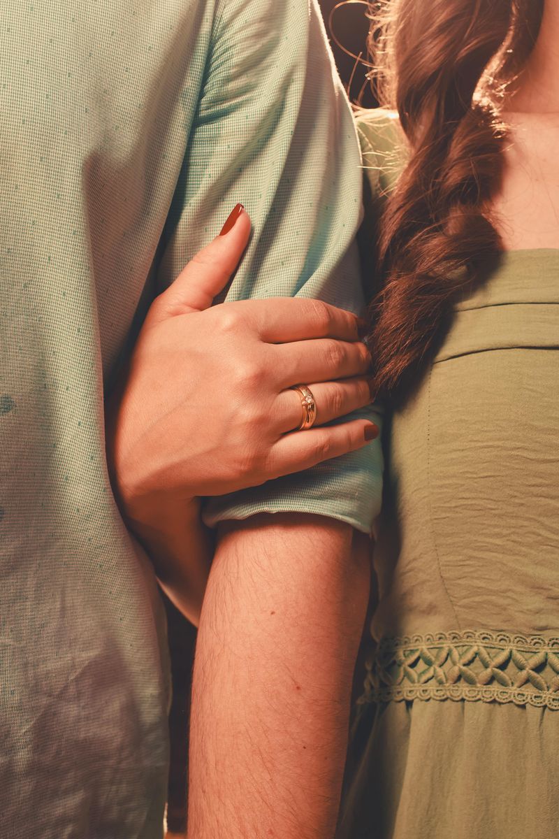 Resting a Hand on His Arm During Conversation