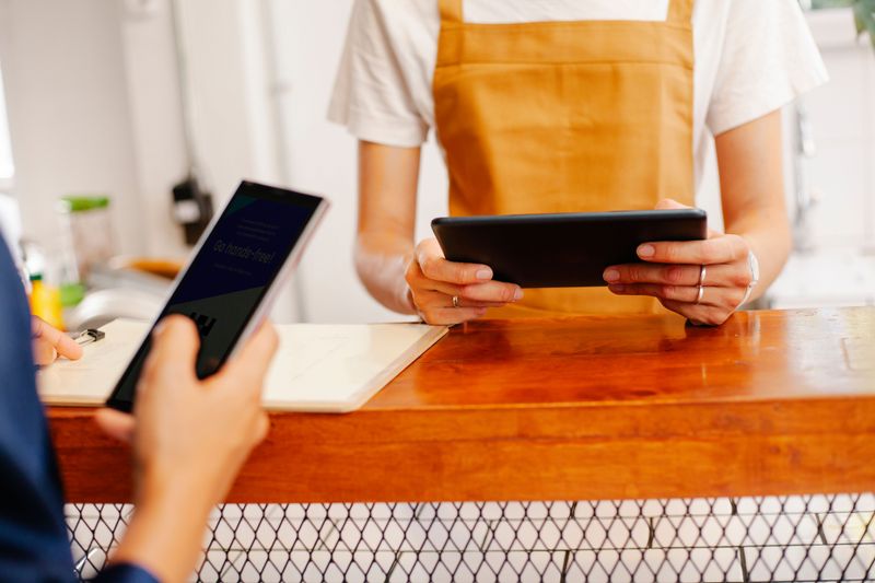 Shopping, Texting, or Scrolling While Being Served