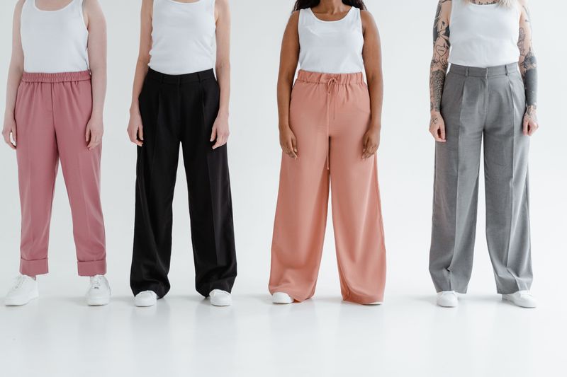 Wearing High-Waisted Pleated Pants with a Loose Fit