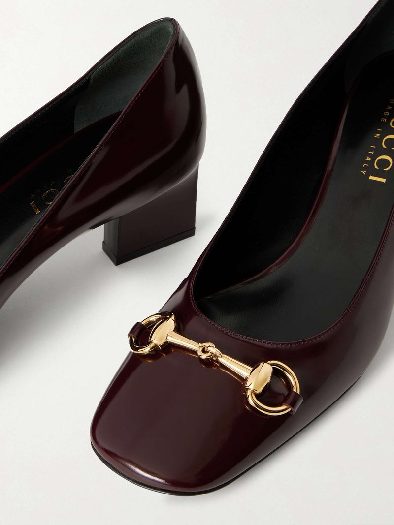 Gucci Signora Horsebit-Embellished Glossed Leather Pumps