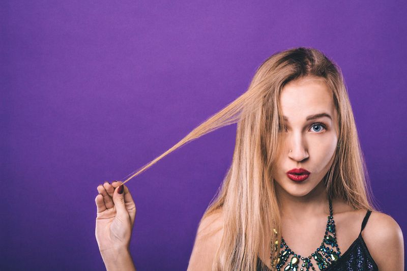 Playing With Hair or Clothing